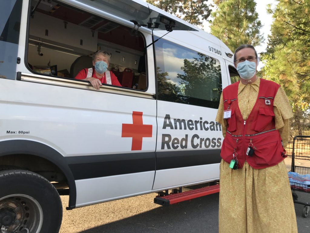 Red Cross volunteers Rachel Brubaker and Joyce Monnin delivering meals in Butte Falls, Oregon. Photo by Lynette Nyman/American Red Cross.