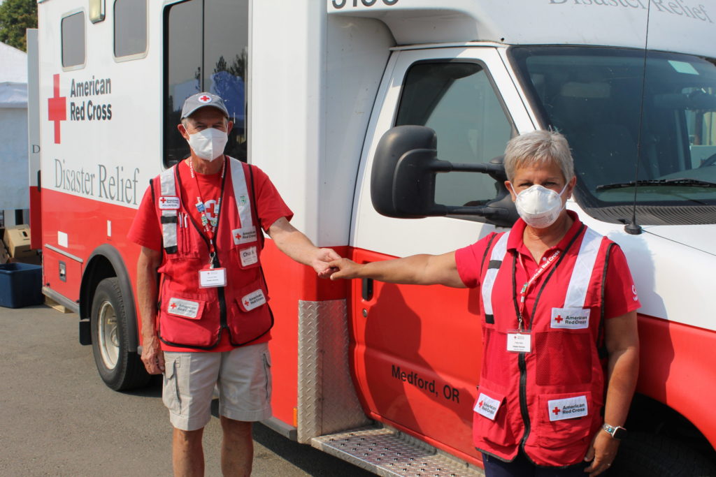 Patty and Chuck Albin, photographed Sept. 23, 2020 while responding to wildfires that burned near their hometown, are partners in Red Cross adventures and life. Photo by Axl David/American Red Cross.