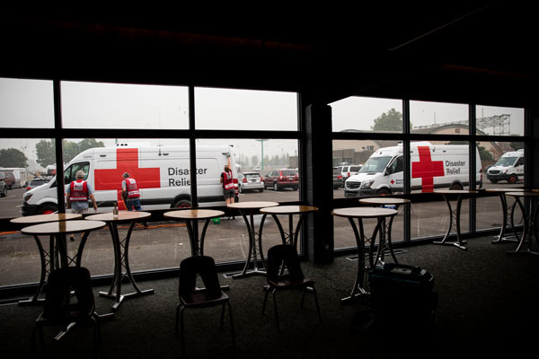 American Red Cross workers wash Emergency Response Vehicles on Sept. 15, 2020 at a command post and shelter run by the Red Cross, in Salem, OR. Photo by Scott Dalton/American Red Cross.