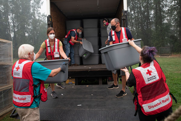 Members of the Silverton Creek Fellowship are working in partnership with the American Red Cross to build sifters. These sifters will be used to salvage items remaining at burned homes. The sifters are loaded into a truck that will deliver them to families affected by the wildfires in Silverton, OR. Photo by Scott Dalton/American Red Cross.