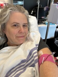 Katrina in the hospital bed awaiting blood.